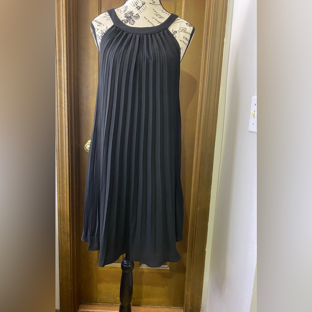 Fun and flirty Black Pleated Dress.